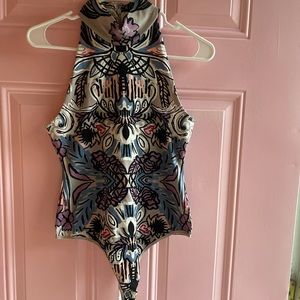 Free people pattern bodysuit new with tags